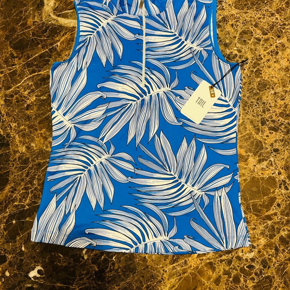 Lavish Blue Tail sleeveless Monarch Pacific Palm zip mock golf top